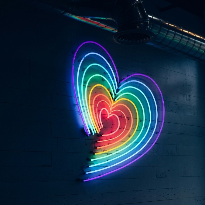 lgbtq-mindfulness-group-insight-la-photo-jiroe-matia-unsplash Neon rainbow heart, representing the LGBTQ+ Mindfulness group at InsightLA, with Robert Lurye.