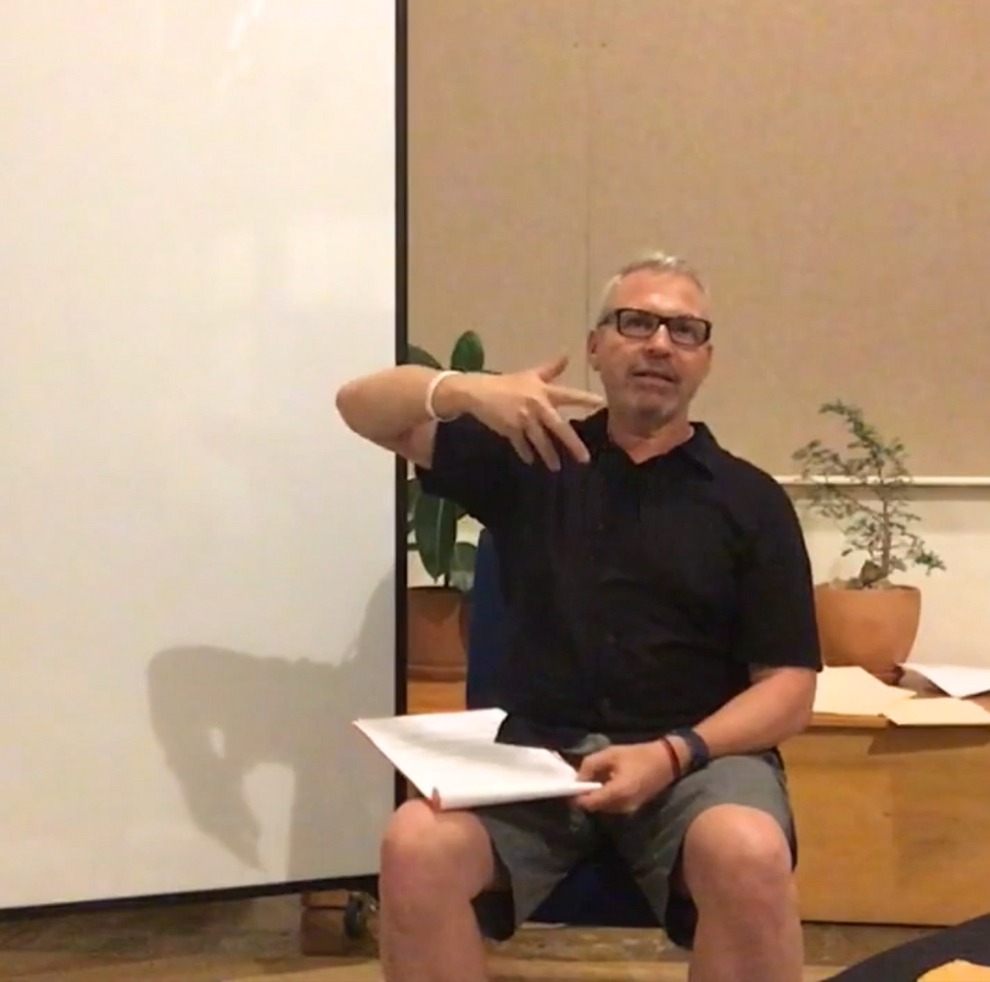 Robert Lurye in a classroom, teaching mindfulness meditation.